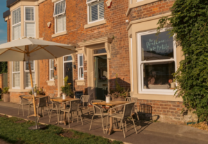 Golden-Hour Boathouse Café Terrace